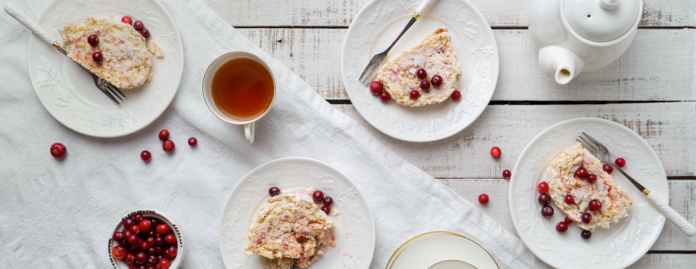 Table,Set,For,Tea,With,Meringue,Roulade,,Fresh,Cranberries,,Tea